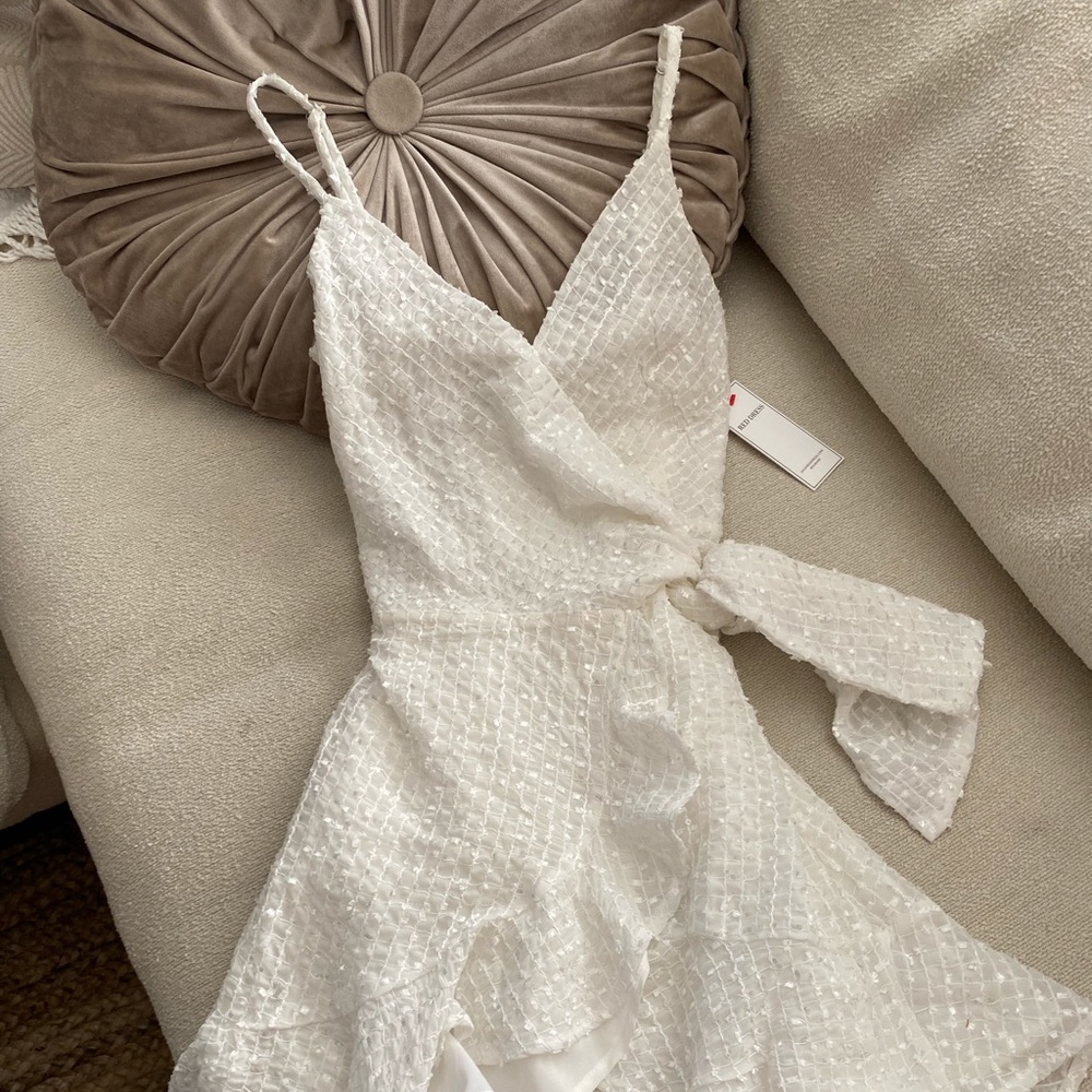 NWT Saints + Secrets Mini Wrap dress in White